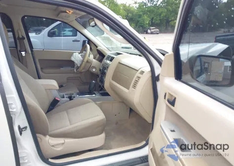 2009 Ford Escape Xlt z USA, uszkodzony, nr VIN 1FMCU03759KC03621